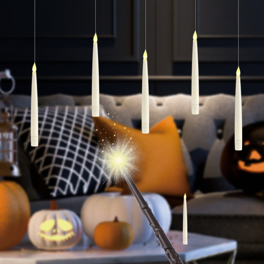Harry Potter floating Halloween candles with magic wand in spooky living room décor.