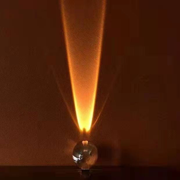 Ambiance lamp casting relaxing sunset vibes for cozy bedroom settings.