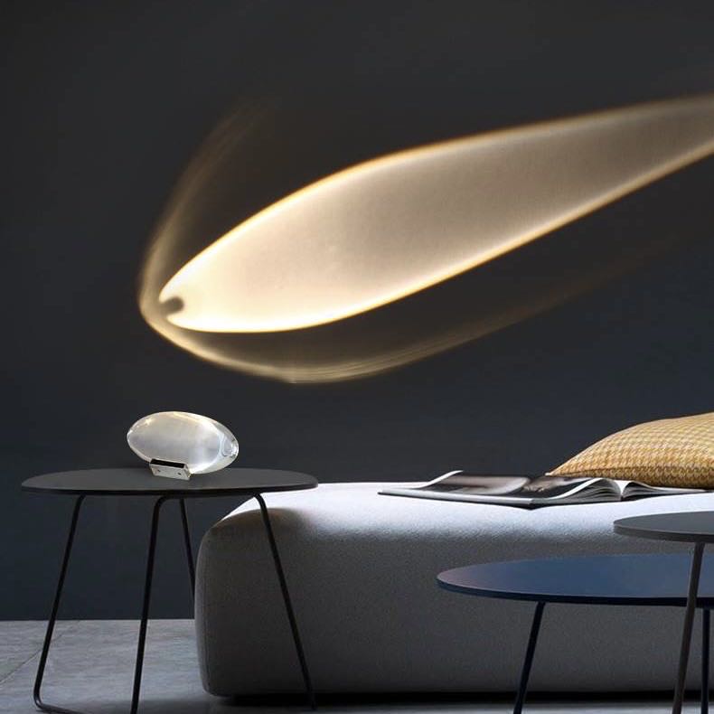 Ambiance lamp creating warm sunset glow for comfortable room setting.